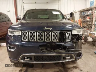 2017 Jeep Grand Cherokee Overland with VIN 1C4RJFCG3HC693897, listed as a IAAI auction lot 41636323 with 105,575 mi miles. Bid and sale history available at carsss.com. Image 6.