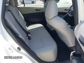 2022 Toyota Corolla Cross LE z VIN 7MUBAAAG5NV028801, wystawiony jako IAAI lot #42144175 z przebiegiem 22 715 mil mil oraz . Historia ofert i sprzedaży dostępna na DreamBid. Obrazek 8.