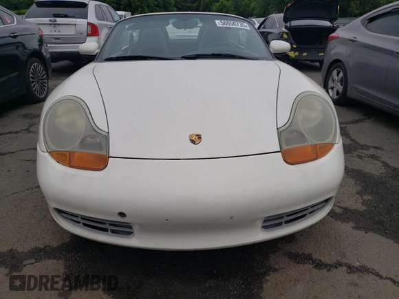2001 Porsche Boxster z VIN WP0CA29821U622592, wystawiony jako Copart lot #56050735 z przebiegiem Nie podano mil oraz Szkoda całkowita • Salvage title. Historia ofert i sprzedaży dostępna na DreamBid. Obrazek 5.