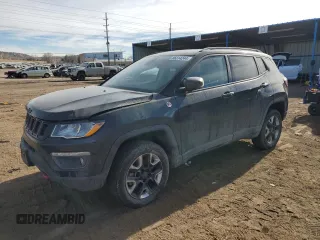 2018 Jeep Compass Trailhawk with VIN 3C4NJDDB9JT337597, listed as a Copart auction lot 86314244 with 88,873 mi miles and Salvage Title. Bid and sale history available at carsss.com. Image 1.