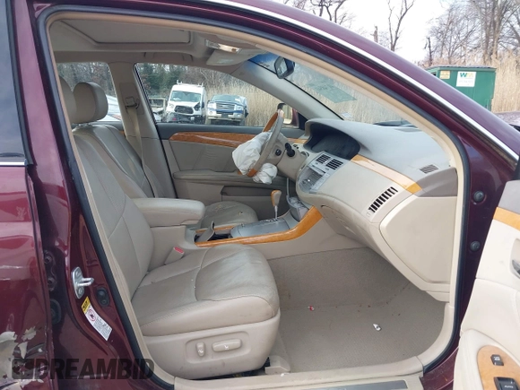 2007 Toyota Avalon XL with VIN 4T1BK36B37U173085, listed as a IAAI auction lot 41748541 with 164,021 mi miles. Bid and sale history available at carsss.com. Image 5.