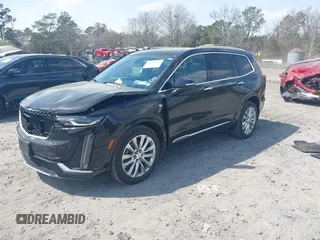 2020 Cadillac XT6 AWD Premium Luxury with VIN 1GYKPDRSXLZ157822, listed as a IAAI auction lot 41806340 with 41,776 mi miles and . Bid and sale history available at DreamBid. Image 2.