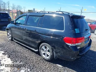 2008 Honda Odyssey Touring with VIN 5FNRL38948B029193, listed as a IAAI auction lot 41618424 with 219,964 mi miles. Bid and sale history available at carsss.com. Image 3.