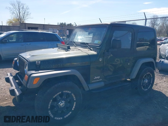 2006 Jeep Wrangler SE with VIN 1J4FA29116P763914, listed as a IAAI auction lot 42140140 with 107,161 mi miles. Bid and sale history available at carsss.com. Image 18.