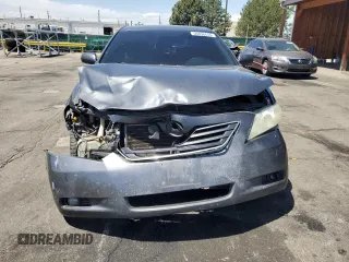 2008 Toyota Camry LE z VIN 4T1BK46KX8U054845, wystawiony jako Copart lot #56856655 z przebiegiem 247 135 mil mil oraz Szkoda całkowita • Salvage title. Historia ofert i sprzedaży dostępna na DreamBid. Obrazek 5.