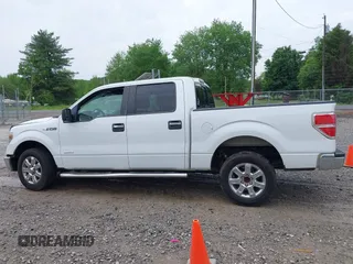 2014 Ford F-150 XL with VIN 1FTFW1CT0EKF51223, listed as a IAAI auction lot 42117076 with 176,505 mi miles. Bid and sale history available at carsss.com. Image 14.