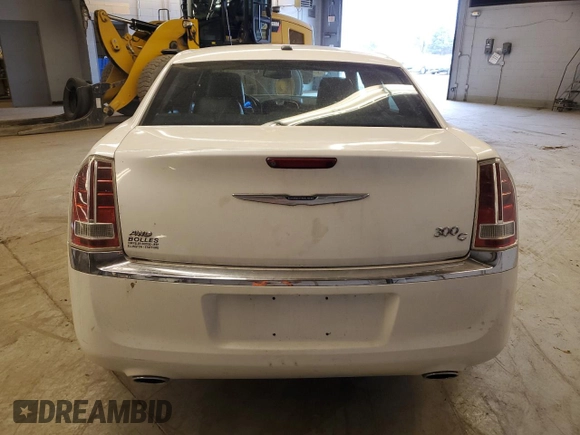 2012 Chrysler 300 C with VIN 2C3CCAKT4CH220294, listed as a Copart auction lot 77615204 with 83,852 mi miles and Clean Title. Bid and sale history available at DreamBid. Image 6.