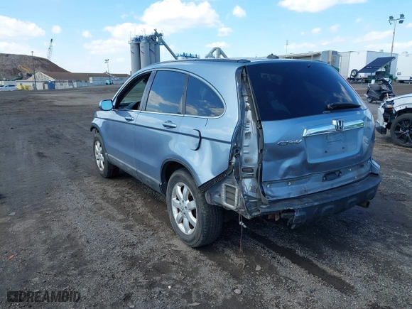 2009 Honda CR-V EX-L with VIN 5J6RE48799L065209, listed as a IAAI auction lot 41868398 with 111,385 mi miles. Bid and sale history available at carsss.com. Image 3.