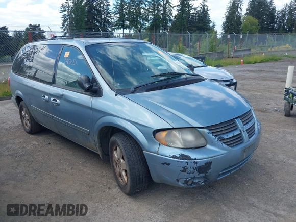 2005 Dodge Caravan SXT with VIN 2D4GP44LX5R528909, listed as a IAAI auction lot 42248957 with Not Provided miles and . Bid and sale history available at DreamBid. Image 1.