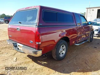 2003 Ford F-150 XL with VIN 1FTRX17W43NA07186, listed as a IAAI auction lot 41864354 with 123,565 mi miles. Bid and sale history available at carsss.com. Image 4.