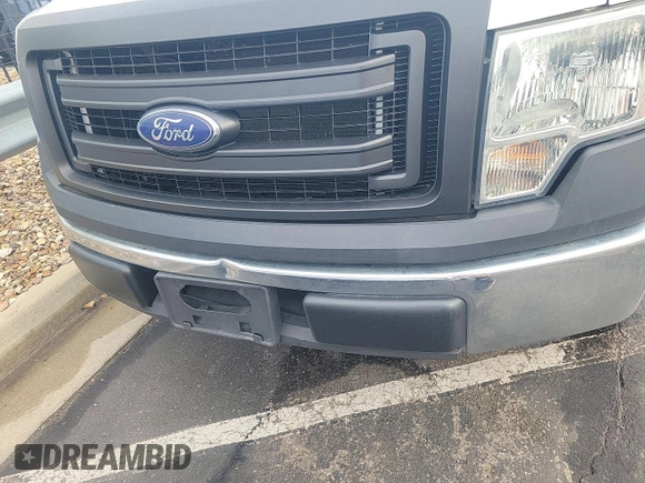 2013 Ford F-150 XL z VIN 1FTMF1CM4DKE18754, wystawiony jako IAAI lot #42844298 z przebiegiem 71 624 mil mil oraz . Historia ofert i sprzedaży dostępna na DreamBid. Obrazek 21.