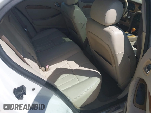 2003 Jaguar S-Type with VIN SAJEA01U93HM89560, listed as a IAAI auction lot 42115289 with 236,905 mi miles and . Bid and sale history available at DreamBid. Image 8.
