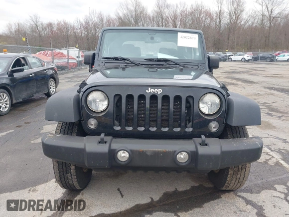 2014 Jeep Wrangler Sport with VIN 1C4AJWAG9EL312856, listed as a IAAI auction lot 42022870 with 98,323 mi miles and . Bid and sale history available at DreamBid. Image 12.