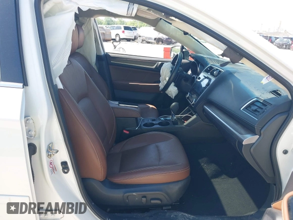 2018 Subaru Outback Touring with VIN 4S4BSATC5J3336205, listed as a IAAI auction lot 42201530 with 103,362 mi miles and . Bid and sale history available at DreamBid. Image 5.