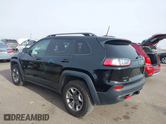 2019 Jeep Cherokee Trailhawk Elite with VIN 1C4PJMBX0KD395421, listed as a IAAI auction lot 41265048 with 70,070 mi miles. Bid and sale history available at carsss.com. Image 3.