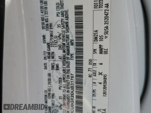 2013 Ford Escape SE with VIN 1FMCU0GX2DUB31767, listed as a Copart auction lot 62208645 with 95,015 mi miles and Salvage title. Bid and sale history available at DreamBid. Image 13.