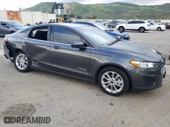 2019 Ford Fusion Hybrid SE with VIN 3FA6P0LU1KR200155, listed as a Copart auction lot 42598013 with 61,762 mi miles. Bid and sale history available at carsss.com. Image 4.