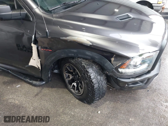 2017 Ram 1500 Rebel z VIN 1C6RR7YT0HS593919, wystawiony jako IAAI lot #41450337 z przebiegiem 164 024 mil mil oraz . Historia ofert i sprzedaży dostępna na DreamBid. Obrazek 6.
