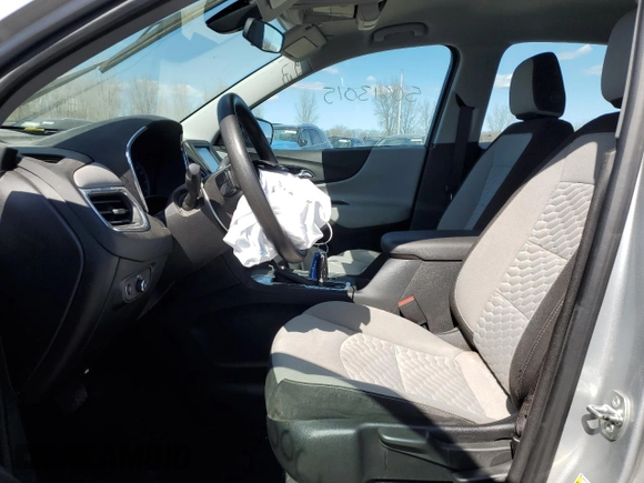 2018 Chevrolet Equinox LS with VIN 3GNAXHEV9JL323297, listed as a Copart auction lot 50613015 with 90,689 mi miles and Salvage Title. Bid and sale history available at DreamBid. Image 7.