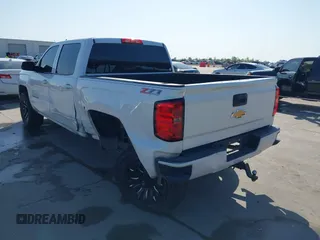 2016 Chevrolet Silverado 1500 LT with VIN 3GCUKREC8GG366278, listed as a IAAI auction lot 41993038 with 176,515 mi miles and . Bid and sale history available at DreamBid. Image 3.