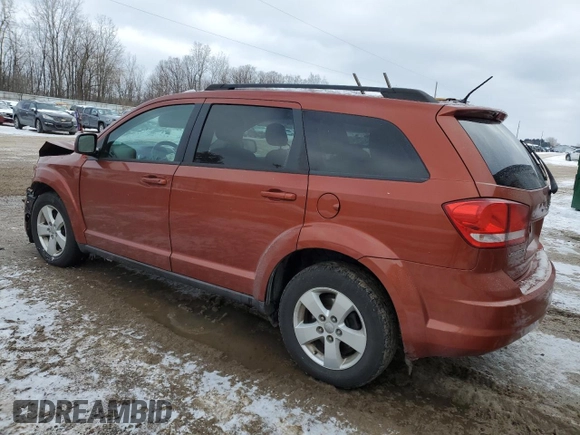 2013 Dodge Journey SE Plus with VIN 3C4PDCABXDT613045, listed as a Copart auction lot 88602235 with 255,617 mi miles and Salvage title. Bid and sale history available at DreamBid. Image 2.