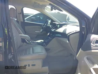 2016 Ford Escape Titanium with VIN 1FMCU0JX5GUC88013, listed as a IAAI auction lot 41933751 with 77,789 mi miles. Bid and sale history available at carsss.com. Image 5.