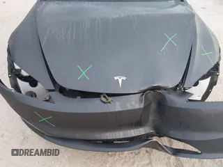 2024 Tesla Model 3 with VIN 5YJ3E1EA0RF748588, listed as a IAAI auction lot 41900733 with 2,547 mi miles. Bid and sale history available at carsss.com. Image 21.