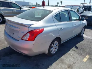 2014 Nissan Versa SV with VIN 3N1CN7AP1EL846198, listed as a IAAI auction lot 41692898 with 104,874 mi miles. Bid and sale history available at carsss.com. Image 4.
