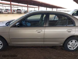 2003 Honda Civic LX with VIN 2HGES16673H537693, listed as a IAAI auction lot 41696832 with 173,842 mi miles. Bid and sale history available at carsss.com. Image 14.