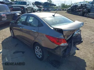 2012 Hyundai Accent GLS with VIN KMHCT4AE4CU097413, listed as a IAAI auction lot 42024571 with 120,672 mi miles. Bid and sale history available at carsss.com. Image 3.