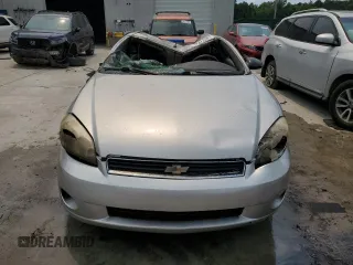 2006 Chevrolet Monte Carlo LS z VIN 2G1WJ15KX69247931, wystawiony jako Copart lot #57317285 z przebiegiem 165 525 mil mil oraz Nie do naprawy. Historia ofert i sprzedaży dostępna na DreamBid. Obrazek 5.