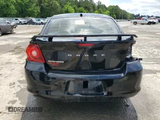 2014 Dodge Avenger SE z VIN 1C3CDZAB9EN154775, wystawiony jako Copart lot #54189515 z przebiegiem 134 627 mil mil oraz Szkoda całkowita • Salvage title. Historia ofert i sprzedaży dostępna na DreamBid. Obrazek 6.