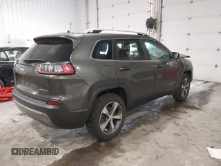 2019 Jeep Cherokee Limited with VIN 1C4PJMDX2KD467412, listed as a IAAI auction lot 42087391 with 106,168 mi miles and . Bid and sale history available at DreamBid. Image 4.