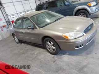 2006 Ford Taurus SE with VIN 1FAFP53U46A123827, listed as a IAAI auction lot 42042946 with 146,393 mi miles. Bid and sale history available at carsss.com. Image 1.