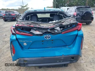 2017 Toyota Prius Plus z VIN JTDKARFP4H3067953, wystawiony jako IAAI lot #42211132 z przebiegiem 90 760 mil mil oraz . Historia ofert i sprzedaży dostępna na DreamBid. Obrazek 16.