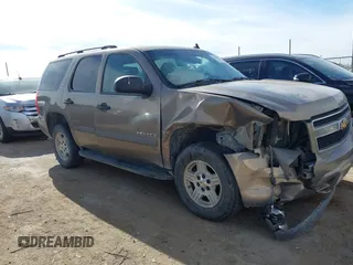 2007 Chevrolet Tahoe LTZ z VIN 1GNFC130X7R241919, wystawiony jako IAAI lot #41270202 z przebiegiem Nie podano mil oraz . Historia ofert i sprzedaży dostępna na DreamBid. Obrazek 13.