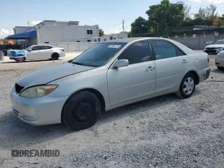 2002 Toyota Camry LE z VIN 4T1BE32K92U106545, wystawiony jako Copart lot #57862715 z przebiegiem 193 834 mil mil oraz Szkoda całkowita • Salvage title. Historia ofert i sprzedaży dostępna na DreamBid. Obrazek 1.