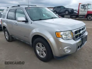 2011 Ford Escape Hybrid with VIN 1FMCU5K3XBKC63377, listed as a IAAI auction lot 41723194 with 155,648 mi miles and . Bid and sale history available at DreamBid. Image 1.