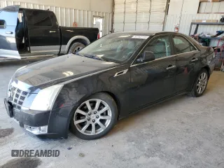 2012 Cadillac CTS Luxury with VIN 1G6DF5E59C0156661, listed as a Copart auction lot 53162115 with 49,605 mi miles and Salvage Title. Bid and sale history available at DreamBid. Image 1.