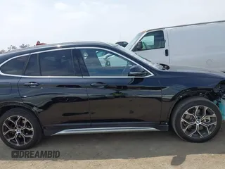 2021 BMW X1 sDrive28i with VIN WBXJG7C0XM5T45715, listed as a IAAI auction lot 42014499 with 23,793 mi miles and . Bid and sale history available at DreamBid. Image 14.
