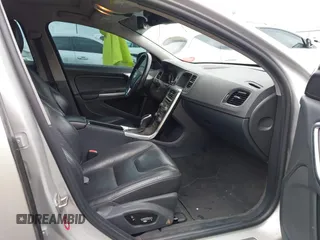 2014 Volvo S60 T5 with VIN YV1612FS0E1291364, listed as a IAAI auction lot 42130425 with 140,497 mi miles. Bid and sale history available at carsss.com. Image 5.
