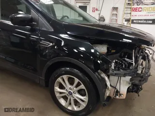 2017 Ford Escape SE with VIN 1FMCU9GDXHUA07522, listed as a IAAI auction lot 40875214 with 114,175 mi miles. Bid and sale history available at carsss.com. Image 18.