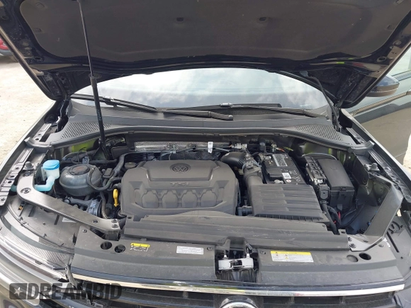 2023 Volkswagen Tiguan SE R-Line Black with VIN 3VVCB7AX0PM122636, listed as a IAAI auction lot 42040494 with 8,589 mi miles and . Bid and sale history available at DreamBid. Image 10.