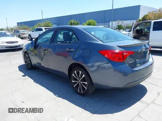 2017 Toyota Corolla L with VIN 5YFBURHE6HP575352, listed as a IAAI auction lot 42417810 with 248,626 mi miles and . Bid and sale history available at DreamBid. Image 3.