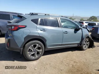2024 Subaru Crosstrek Premium z VIN JF2GUADC9R8305042, wystawiony jako Copart lot #55796805 z przebiegiem 9 518 mil mil oraz Szkoda całkowita • Salvage title. Historia ofert i sprzedaży dostępna na DreamBid. Obrazek 3.