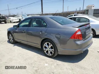 2012 Ford Fusion SE with VIN 3FAHP0HG7CR181740, listed as a Copart auction lot 65853665 with 159,798 mi miles and Clean title. Bid and sale history available at DreamBid. Image 2.