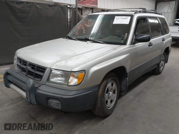 2000 Subaru Forester L with VIN JF1SF6357YH730850, listed as a IAAI auction lot 41772007 with 177,039 mi miles. Bid and sale history available at carsss.com. Image 2.