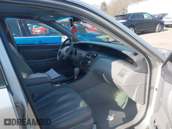 2003 Toyota Avalon XL with VIN 4T1BF28B13U285647, listed as a IAAI auction lot 41791156 with 173,323 mi miles and . Bid and sale history available at carsss.com. Image 5.