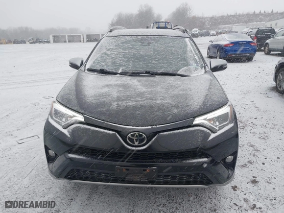 2017 Toyota RAV4 SE with VIN 2T3JFREV5HW591932, listed as a IAAI auction lot 41628183 with 142,599 mi miles. Bid and sale history available at carsss.com. Image 12.