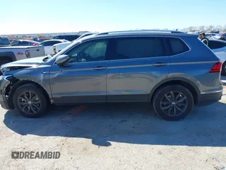2023 Volkswagen Tiguan SE with VIN 3VV3B7AX5PM142378, listed as a IAAI auction lot 41835204 with 13,670 mi miles and . Bid and sale history available at DreamBid. Image 14.
